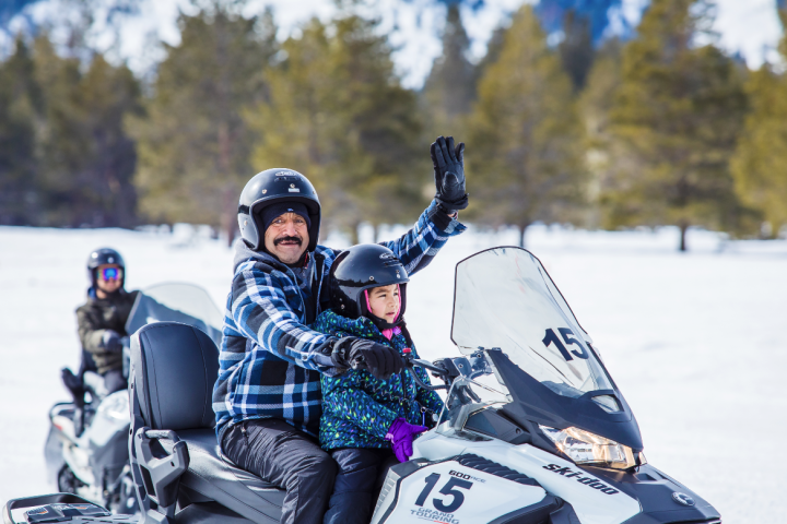 a person riding on the back of a motorcycle