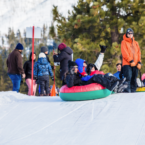 a group of people that are standing in the snow